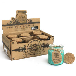 Vela perfumada de cera de soja en frasco de vidrio.